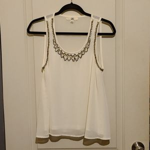 Irony swing tank with beading.